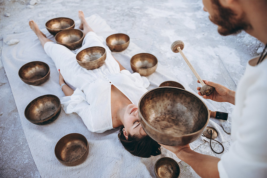 Woman in a session of Sound Healing therapy in Ibiza